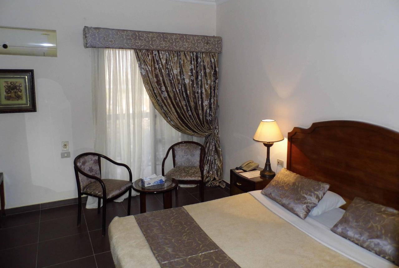 Mg Nefertiti Hotel Эль-Минья Номер фото